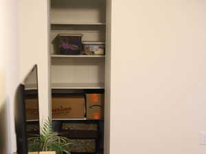 Interior space with baseboards and carpet floors