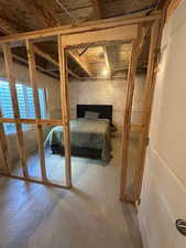 Bedroom with concrete floors