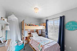 Bedroom featuring carpet floors