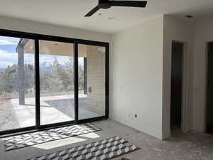 Doorway with baseboards, recessed lighting, ceiling fan, and a healthy amount of sunlight