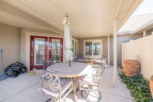 View of patio / terrace with outdoor dining area and fence