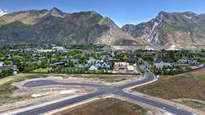 Exterior space featuring a residential view and a mountain view
