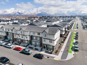 Drone / aerial view with a residential view and a mountain view