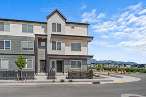 View of front facade featuring stucco siding and a mountain view