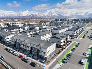 Aerial view featuring a mountain view and a residential view