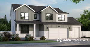 View of front of home with stone siding, board and batten siding, and concrete driveway