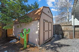 View of shed featuring a fenced backyard/ Not included but negotiable
