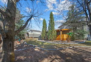 View of yard with central AC