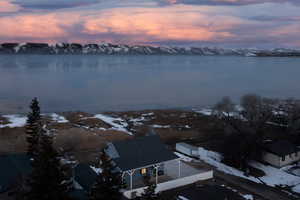 Snowy aerial view with a mountain view