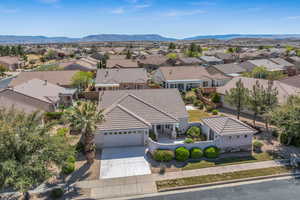 Aerial perspective of suburban area with a mountain backdrop