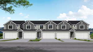 Multi unit property featuring board and batten siding, a garage, and concrete driveway