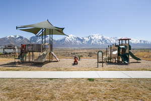 Community play area with a mountain view