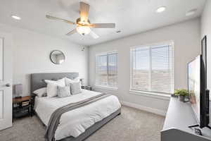 Carpeted bedroom with a textured ceiling, visible vents, baseboards, recessed lighting, and a ceiling fan