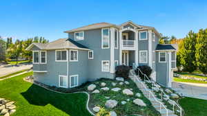 Front of Home with Upper Balcony