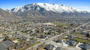 Birds eye view of property featuring a residential view and a mountain view