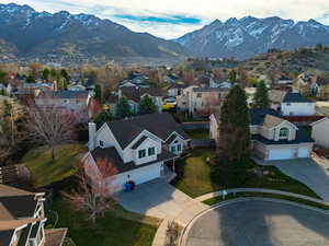 Drone / aerial view with a residential view and a mountain view