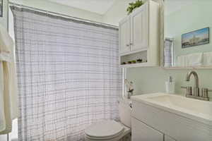 Bathroom featuring toilet and vanity