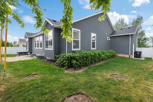 View of home's exterior featuring stucco siding and a patio