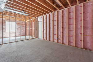 Unfinished area- plumbed for a second basement bathroom and room for a bedroom.