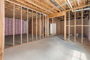 Unfinished area- plumbed for a second basement bathroom and room for a bedroom.