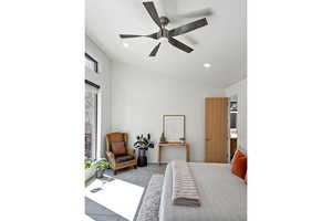 Bedroom with lofted ceiling, recessed lighting, and carpet flooring