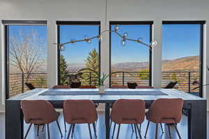 Dining room featuring a mountain view
