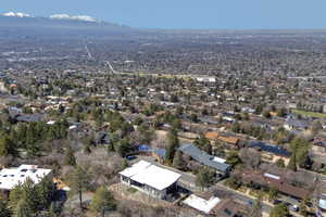 Birds eye view of property featuring a residential view and a mountain view