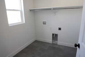 Laundry area featuring baseboards, hookup for an electric dryer, washer hookup, and laundry area