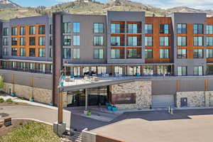 View of building exterior featuring a mountain view