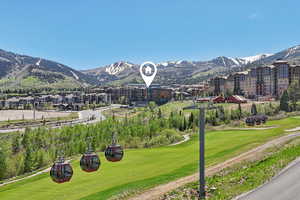 View of mountain backdrop featuring a golf club