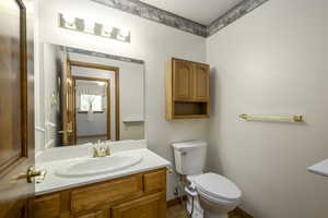 Bathroom with toilet and vanity