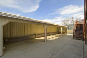 View of patio featuring stairs