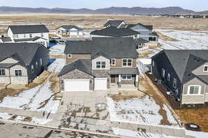 Aerial view featuring a mountain view and a residential view