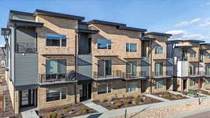 View of building exterior with a residential view