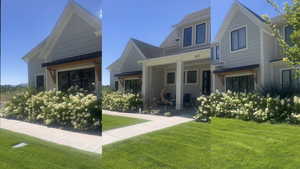 View of front of house featuring a shingled roof and a front yard
