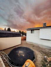 Property exterior at dusk with a huge shed