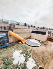 View of yard with McDonald's size jungle gym