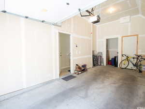Garage featuring a garage door opener
