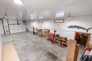 Alternate view from stairs leading to loft displaying workshop area