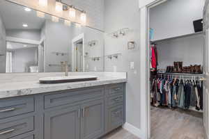 Walk-in closet to the right of the on-suite vanity