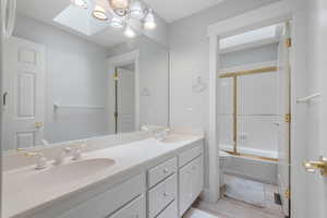 Bathroom #2 - Main floor full bath with double vanity - shared with bedrooms #3 and #4