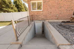 View of walkout leading to basement