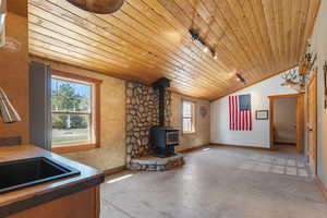 Looking from kitchenette into living space. Open doorway to the far right leads to storage area which could also be combined storage and clothes closet