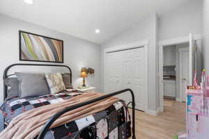 Bedroom #4 with closet and doorway leading to hall