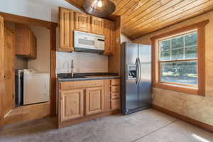 Kitchenette with laundry and bath behind