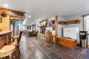Recreation room area looking into second dining area