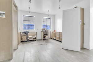 Living area featuring light wood finished floors