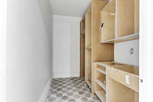 Spacious closet with light floors