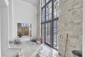 Bathroom featuring a high ceiling