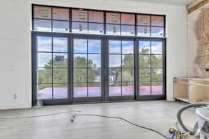 Doorway featuring wood finished floors